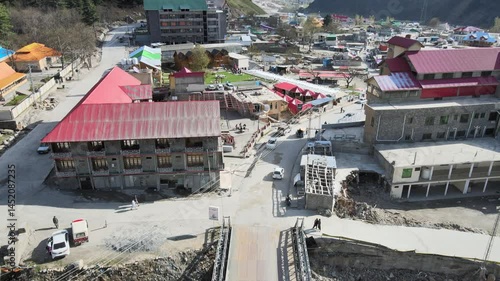 Drone stock footage of Naran town surrounded by mountains in northern Pakistan | Scenic aerial view | FPV 4K HD video | nature travel landscape | cinematic valley drone shot | tourism content