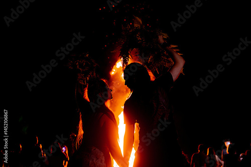 People dance in the firelight on Ivan Kupala