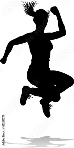 A happy woman jumping for j...