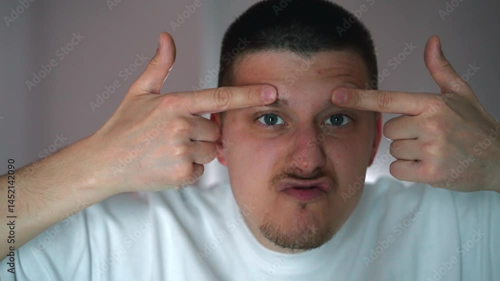 A young guy with a beard in front of a mirror adjusts his eyebrows.
A man combs his eyebrows in the bathroom.
A man with eyebrows in close-up.
Portrait of a guy in front of a mirror A young guy with a beard in front of a mirror adjusts his eyebrows.
A man combs his eyebrows in the bathroom.
A man with eyebrows in close-up.
Portrait of a guy in front of a mirror