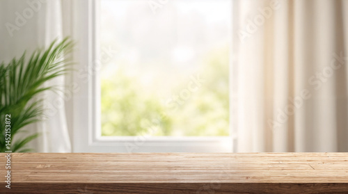 Empty wood table top with window curtain abstract blur background for product display