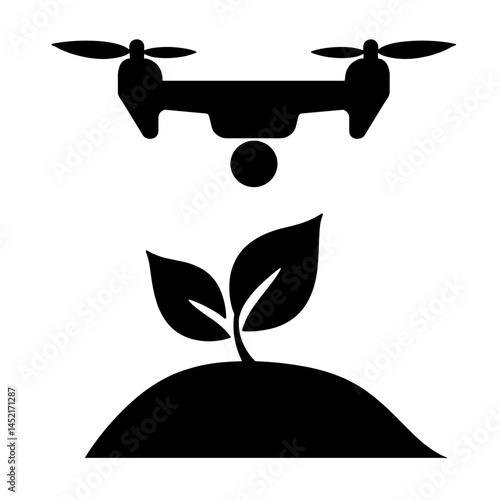 Drone planting sapling in silhouette, promoting reforestation effort