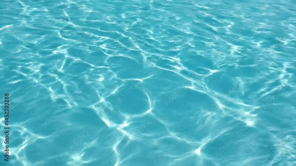 Crystal clear turquoise water with rippling pool surface and sunlight reflections – underwater tropical swimming pool with shimmering textures. Ultra HD 4K 3840x2160 Crystal clear turquoise water with rippling pool surface and sunlight reflections – underwater tropical swimming pool with shimmering textures. Ultra HD 4K 3840x2160