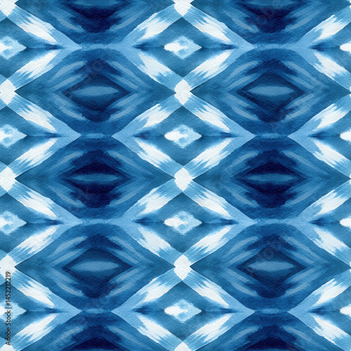 This seamless pattern features geometric design with blue and white diamond shapes creating dynamic visual effect