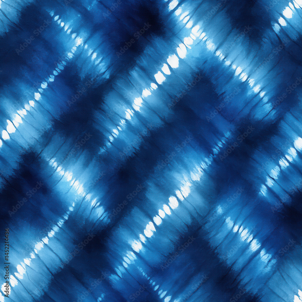 Seamless pattern of blue and white tie dye diagonal stripes creates dynamic and vibrant design