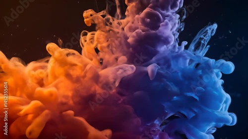 Vibrant Orange and Blue Ink Clouds Dissolving Abstractly in Dark Fluid Motion