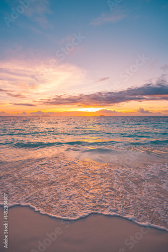 Fototapeta Naklejka Na Ścianę i Meble -  Colorful sunset sky calm waves on closeup sea sand shore. Panoramic tropical beach landscape. Inspire seascape horizon. Tranquil relax summer sun vibe. Best travel vacation serene meditation island