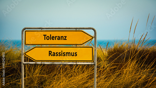 Slika na platnu Signposts the direct way to racism versus tolerance