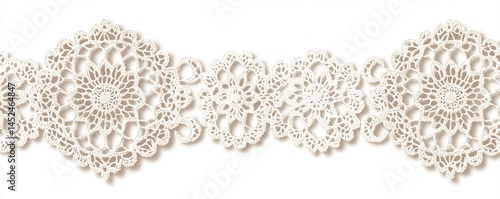 Delicate cream-colored lace with intricate floral and geometric patterns on a white background.