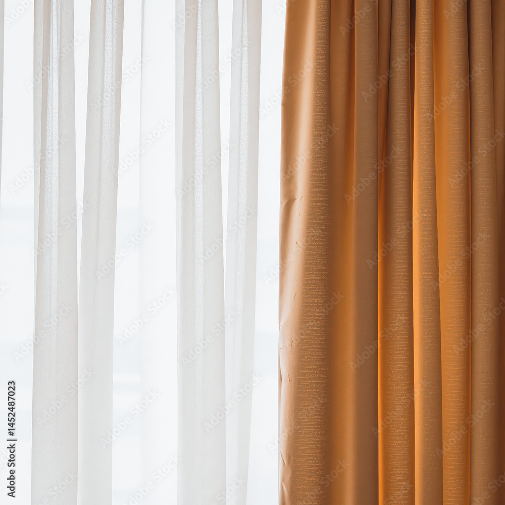 Fototapeta premium sheer white curtains and golden drapes in a well-lit room