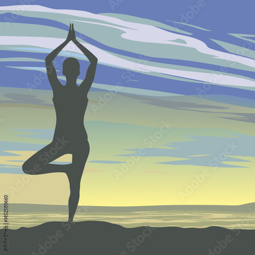 silhouette of a woman practicing yoga