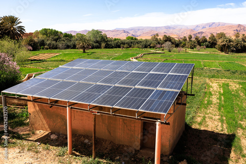 Solar panels providing sustainable energy in Tinghir palm grove