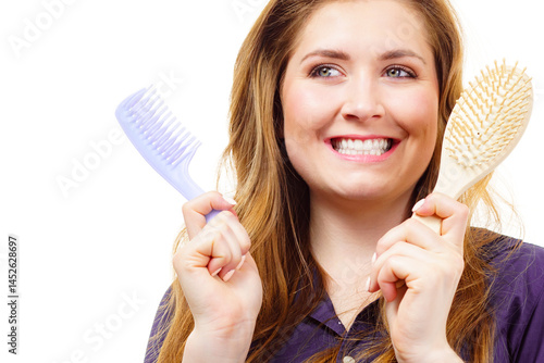 Girl long hair with comb brush