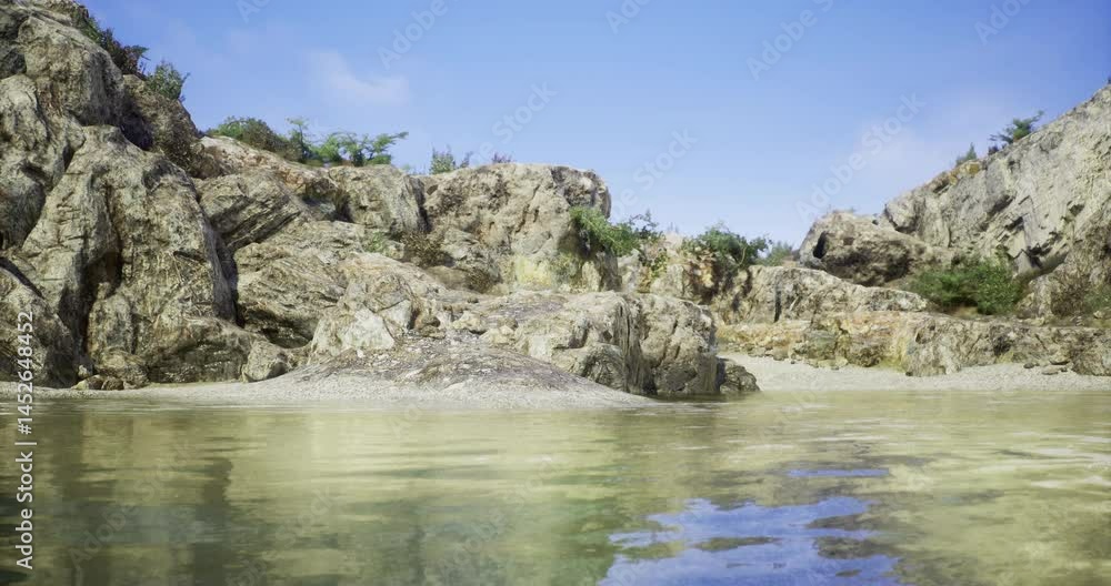 Rocky shoreline with clear, calm water reflects a bright sky. Lush greenery decorates the landscape, creating a serene atmosphere in a tranquil natural setting. Rocky shoreline with clear, calm water reflects a bright sky. Lush greenery decorates the landscape, creating a serene atmosphere in a tranquil natural setting.