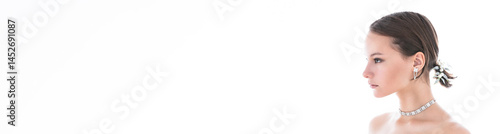 Obraz na płótnie Banner with studio beauty portrait of teen beautiful girl against white background. w salonie