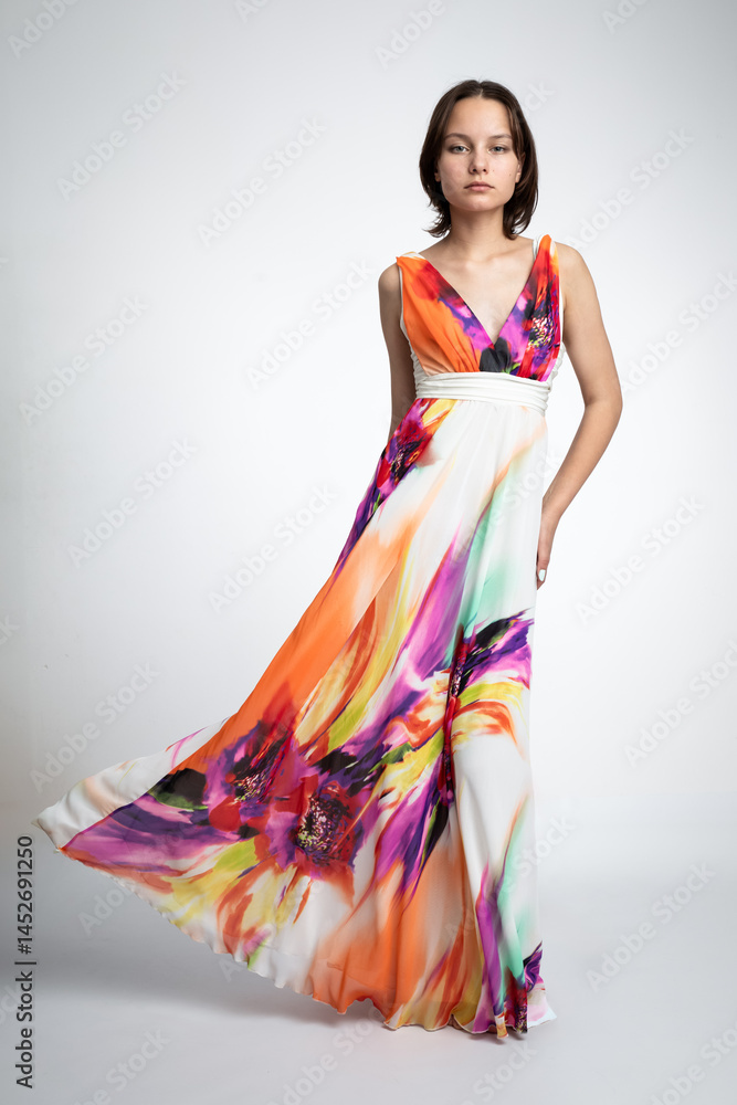 Fashion portrait of beautiful model against white background