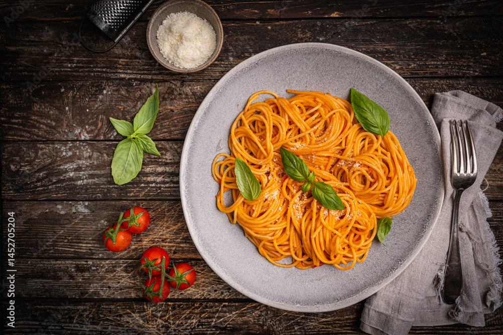 Traditional italian pasta Spaghetti with tomato sauce. Top view with copy space. High quality photo