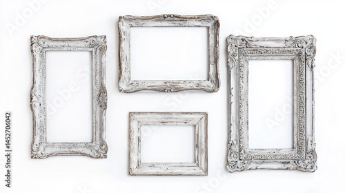 Set of rectangular wooden frames with faded gray finish and ornate details on white background.