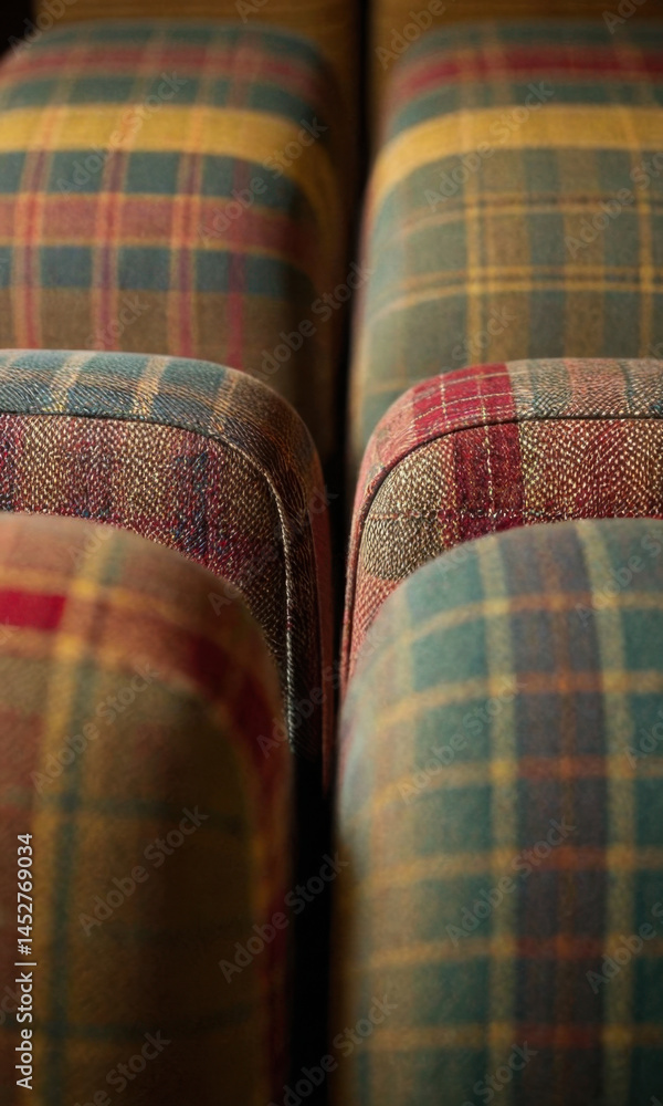 A pair of couches sitting in a modern living room setting