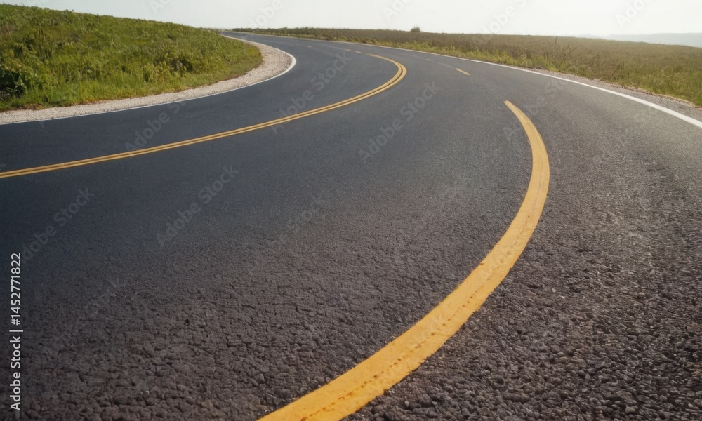 A curved road with two yellow lines, suitable for use in illustrations of travel, adventure, or infrastructure projects