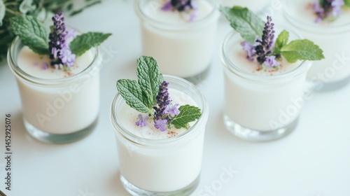 Obraz na płótnie Creamy panna cotta in glass jars garnished w salonie