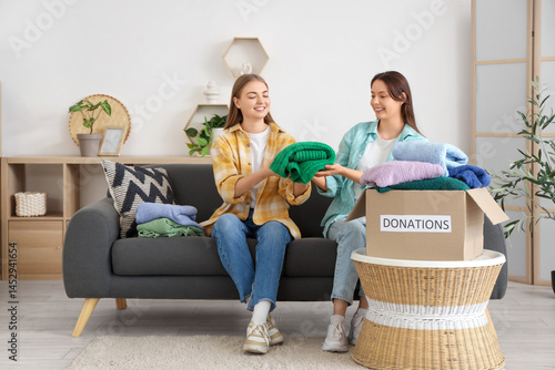 Young women donating their ...