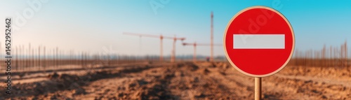 Free Download No Entry Sign Against Construction Background with Cranes and Clear Blue Sky - GFXLoad