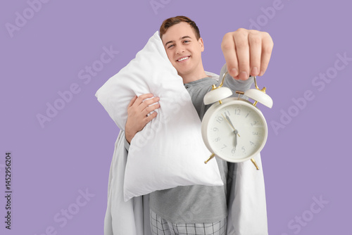Young man with pillow, blan...