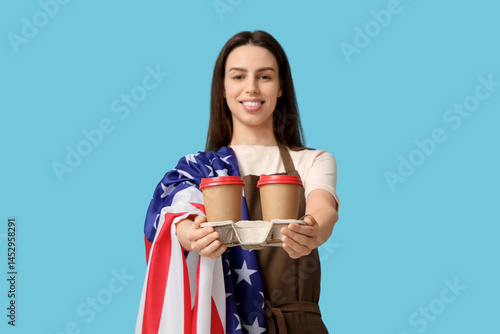 Young female barista with U...