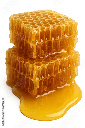Sweet Honeycomb Drizzles Golden Syrup in a Close up Display of Natural Sweetn...
