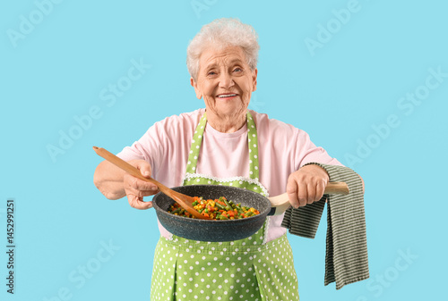 Senior woman with vegetable...