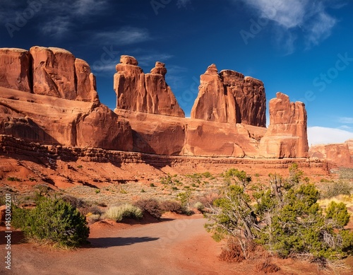 panorama of red sandstone towers and cliff features in arches national park utah landmark known as park avenue