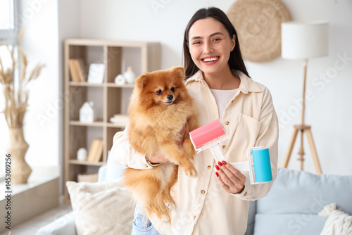 Young woman with fluffy dog...