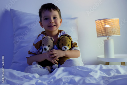 Cute little boy with toys s...
