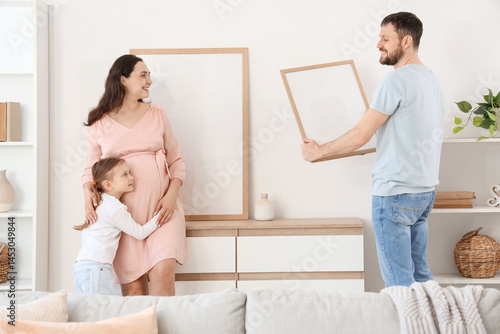Happy family hanging blank ...