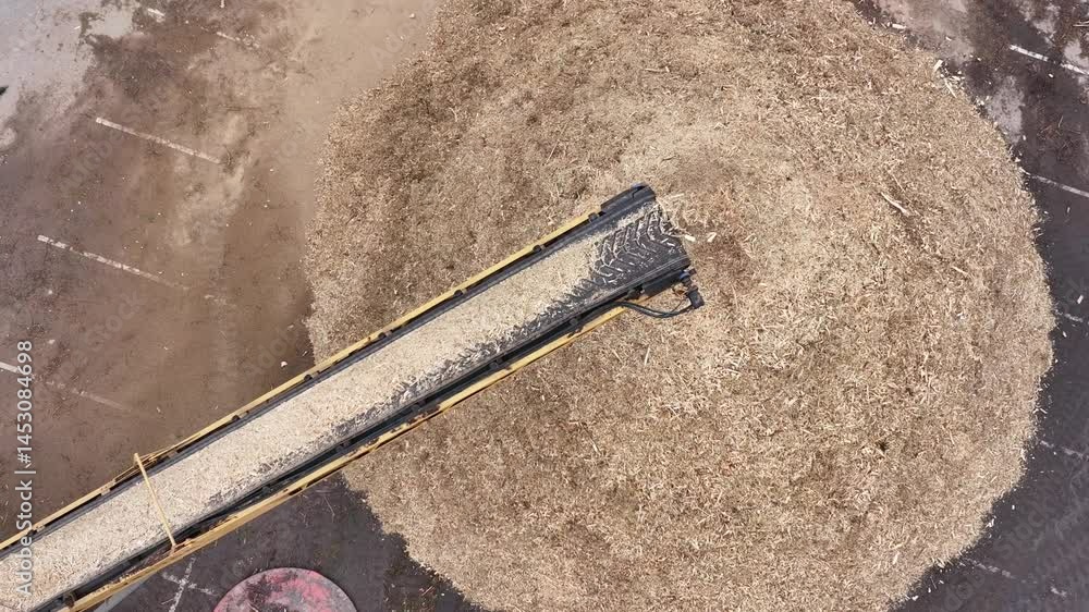 custom made wallpaper toronto digitalSlow-motion drone video captures a conveyor belt end discharging wood chips in a graceful cascade, each chip tumbling into a shifting pile below, set against the textured ground and warm, golden ambie