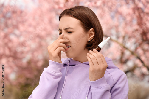 Allergic young woman with n...