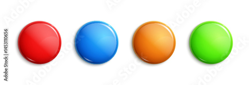 Set of four glossy colorful round buttons in red, blue, orange, and green on white background for interface or design elements