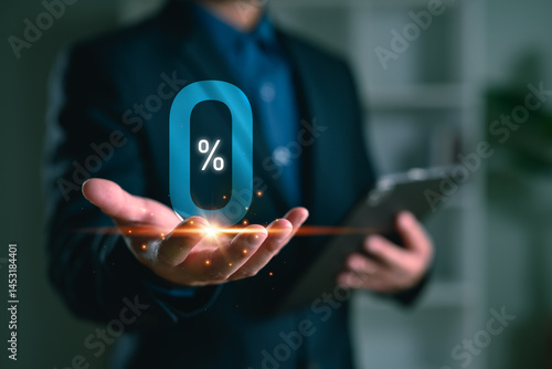 Businessman hand holding 0% hologram, representing zero interest, promotion, financial offer, loan deal, or marketing campaign in modern digital economy.
