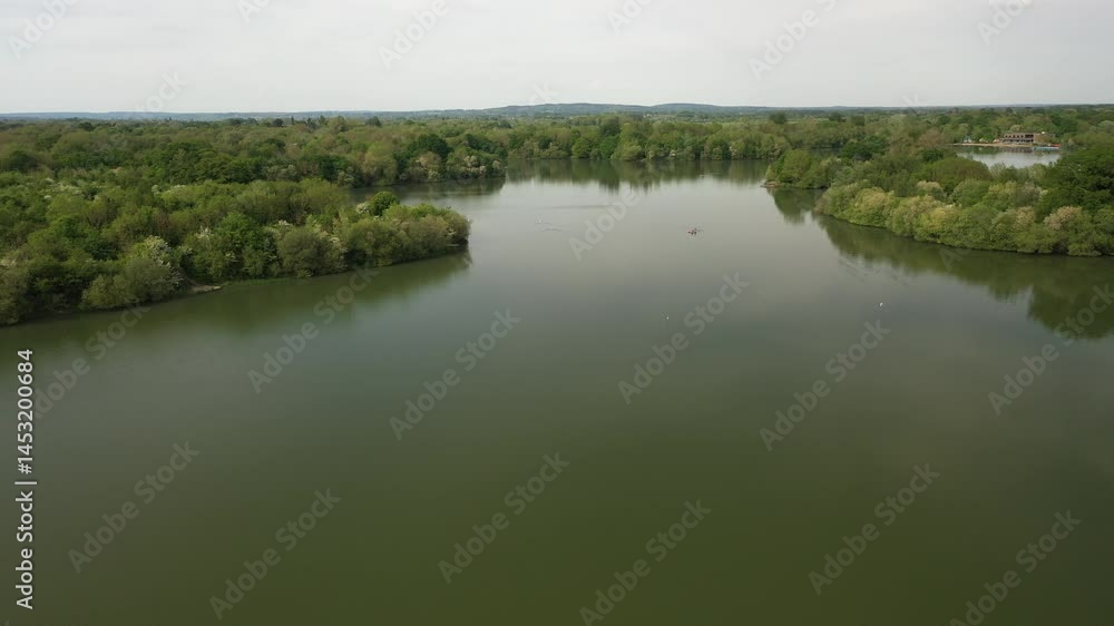 aerial video showcasing a scenic landscape from a moderate altitude.smooth movements that may cover terrain, vegetation, or a natural area.environment like water bodies or buildings in the distance. aerial video showcasing a scenic landscape from a moderate altitude.smooth movements that may cover terrain, vegetation, or a natural area.environment like water bodies or buildings in the distance.