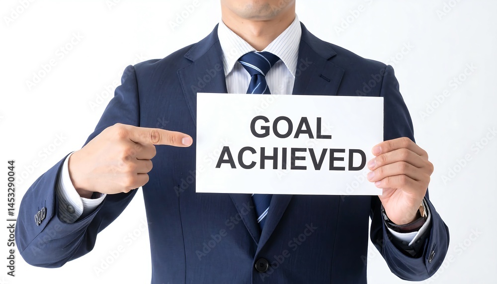 Confident Japanese man in suit pointing proudly at goal achieved message Confident Japanese man in suit pointing proudly at goal achieved message