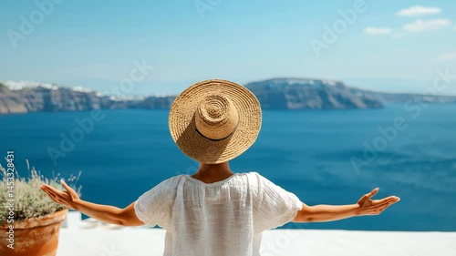 Seaside Serenity: Embracing the vast beauty of the ocean, a figure in a sunhat stands poised on a bright day. Capturing the essence of relaxation and wanderlust.