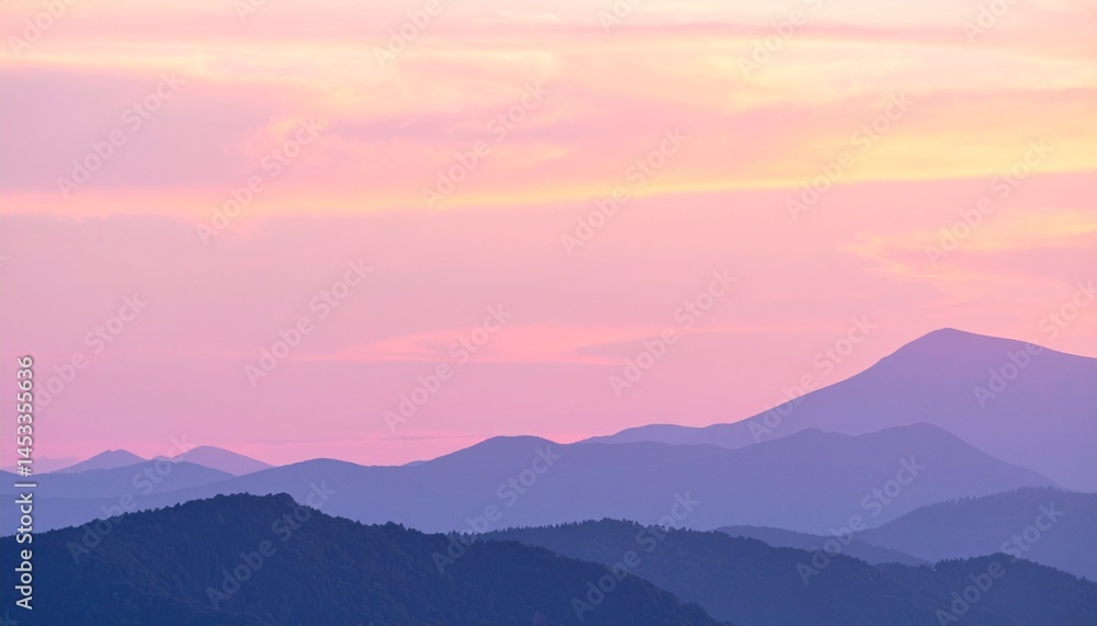 Obraz premium Pastel Pink Purple Mountain Range at Sunset