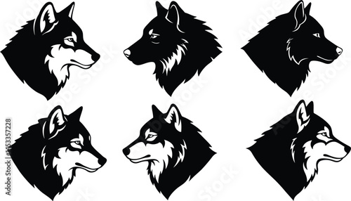 Wolf head silhouettes set in black and white vector illustration with different profile views and facial expressions