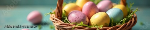 Close-up of speckled and solid-color Easter eggs nestled in a woven basket , vibrant, spring decorations