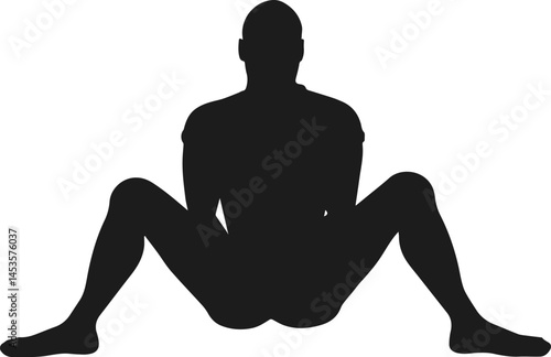 Silhouette of man sitting cross legged in relaxed pose