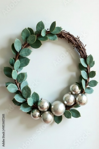Modern minimalist wreath with silver ornaments and eucalyptus, silver, simple