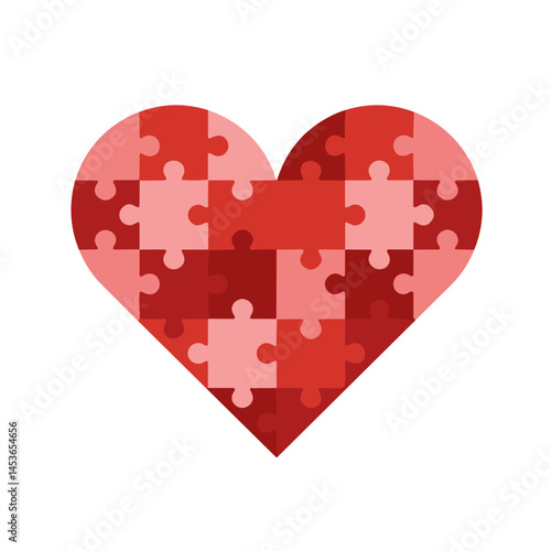 Heart shape made of puzzle pieces in red colors for love concept
