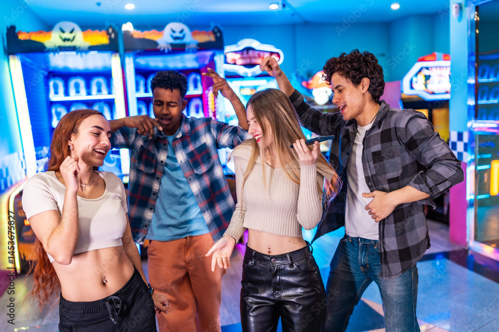 Young people singing karaoke and having fun in an arcade