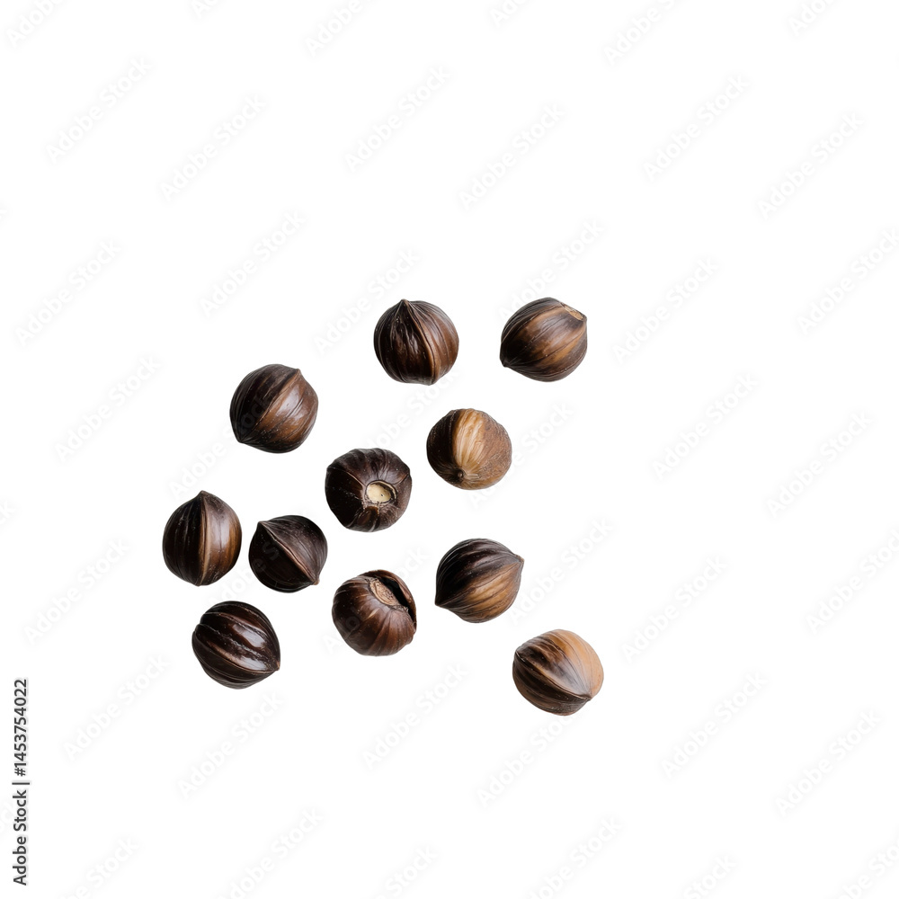 Scattered Hazelnuts on Black Background - Overhead View Scattered Hazelnuts on Black Background - Overhead View